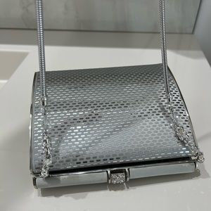 St. John, stunning , silver & embellished clutch with chain. Like new.